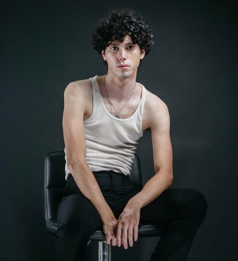 man with natural curly hair