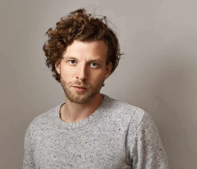 man with curly hair
