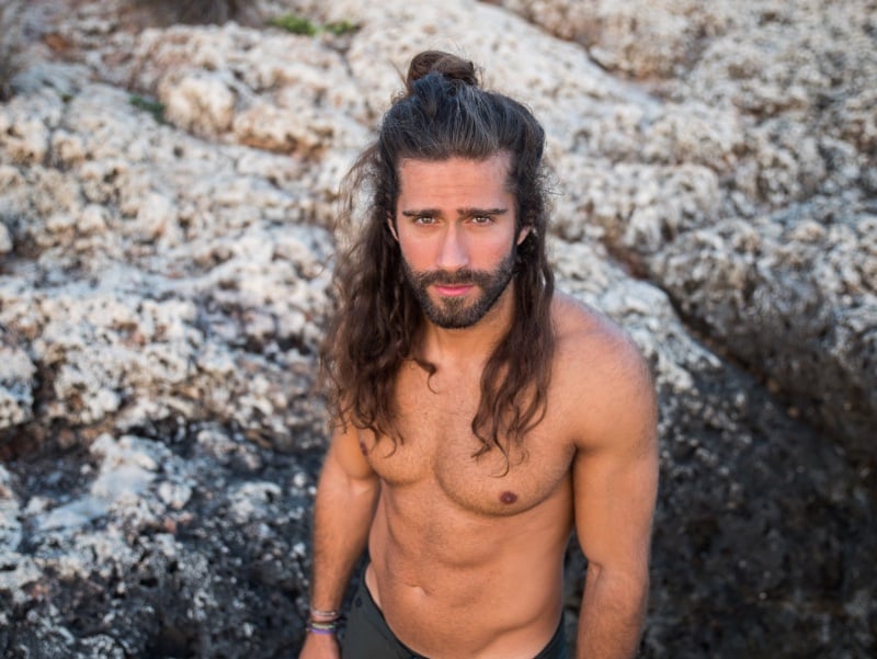 long curly hair men half up man bun