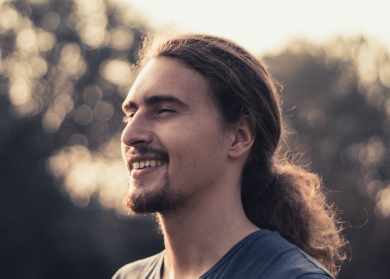long curly hair ponytail men