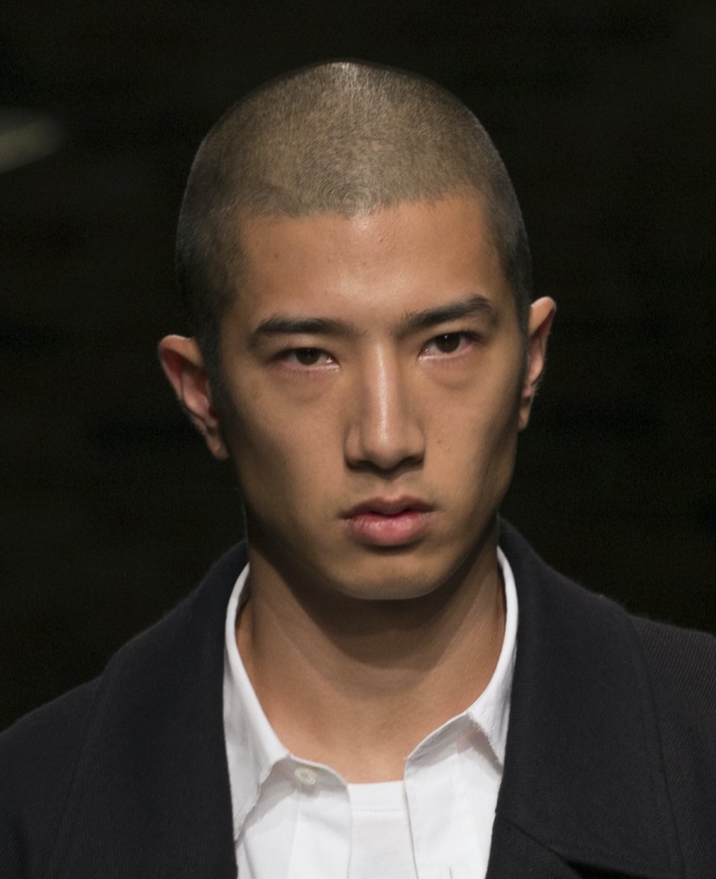 Asian man with an induction cut