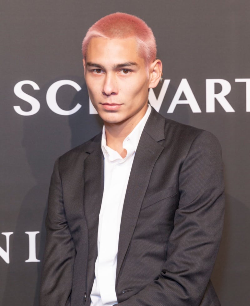 Evan Mock with a pink buzz cut
