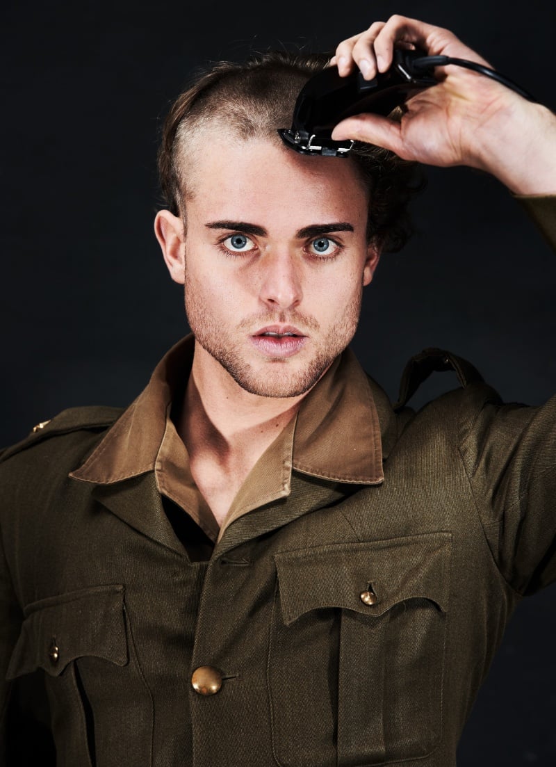 soldier getting a military buzz cut