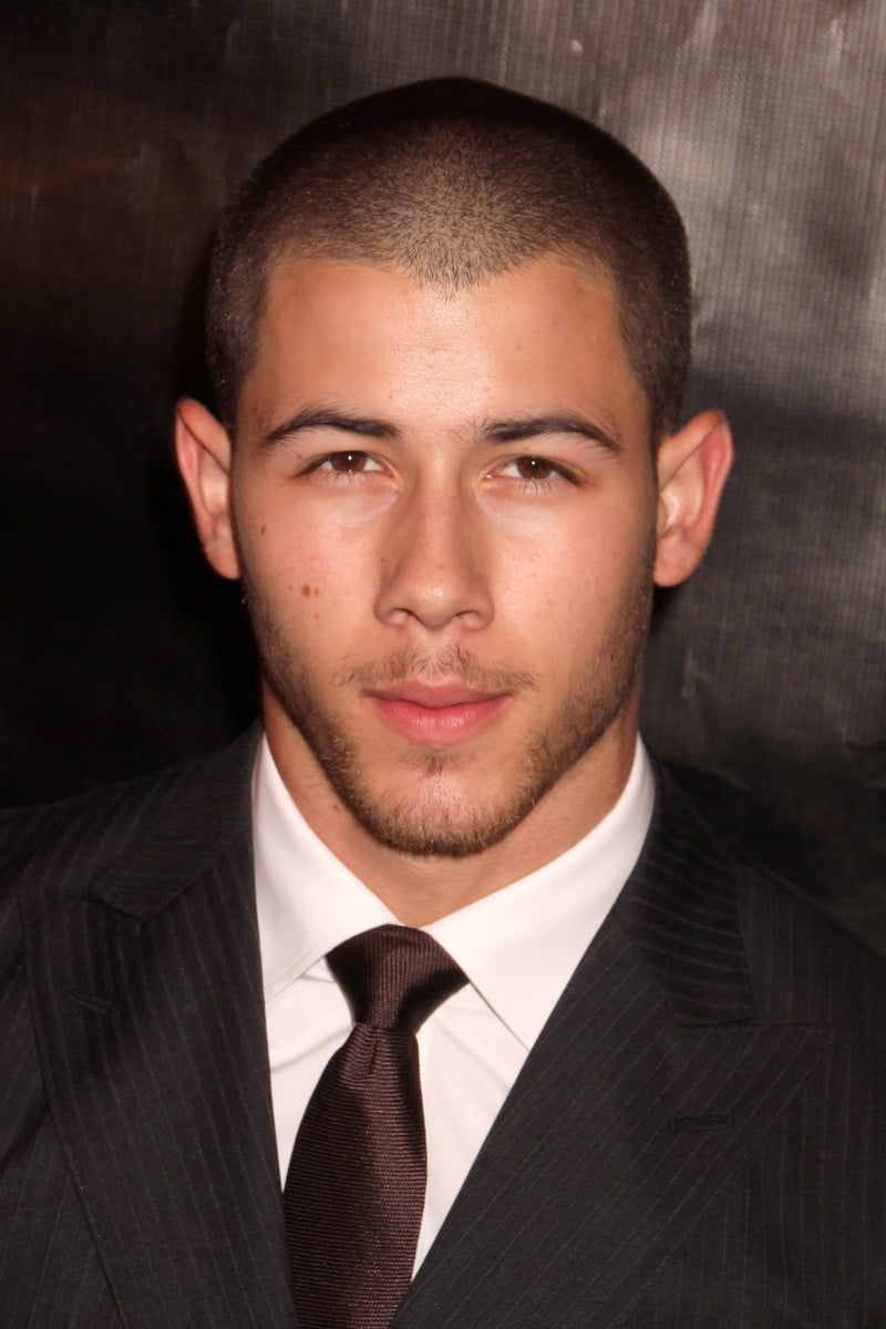 Nick Jonas with a short buzz cut