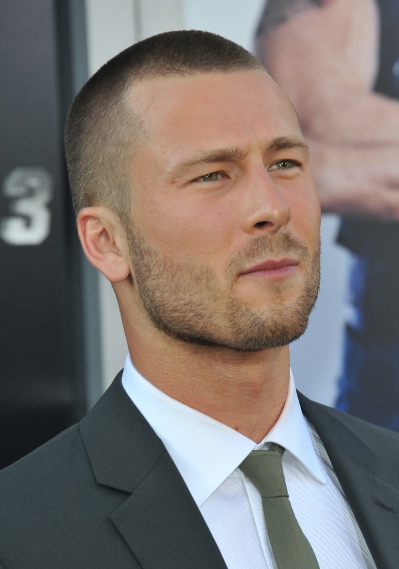 Glen Powell with a buzz cut