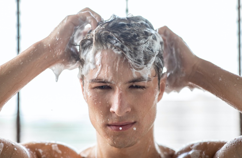 man washing hair