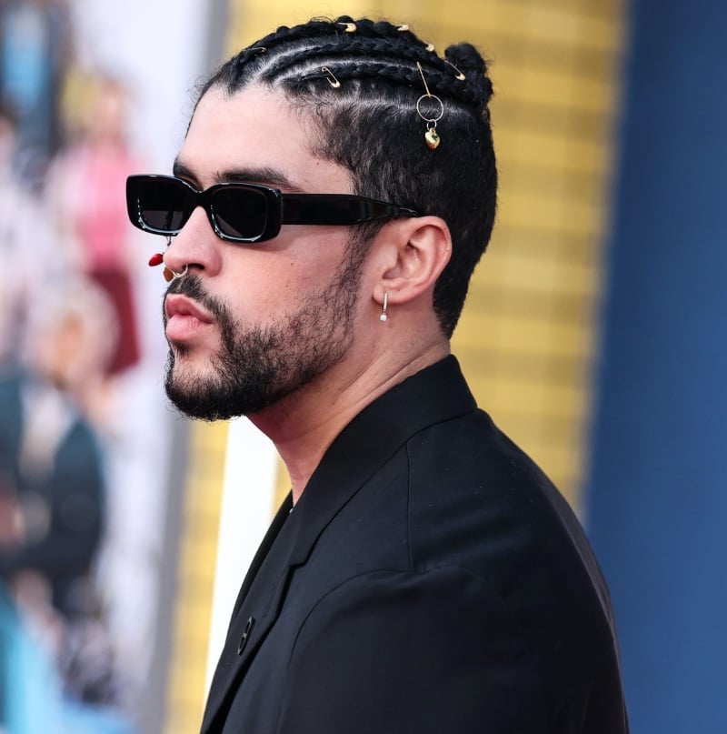 Bad Bunny cornrows bun gold safety pins