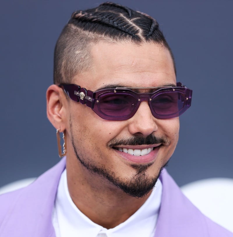 Quincy Brown patterned cornrows high skin fade