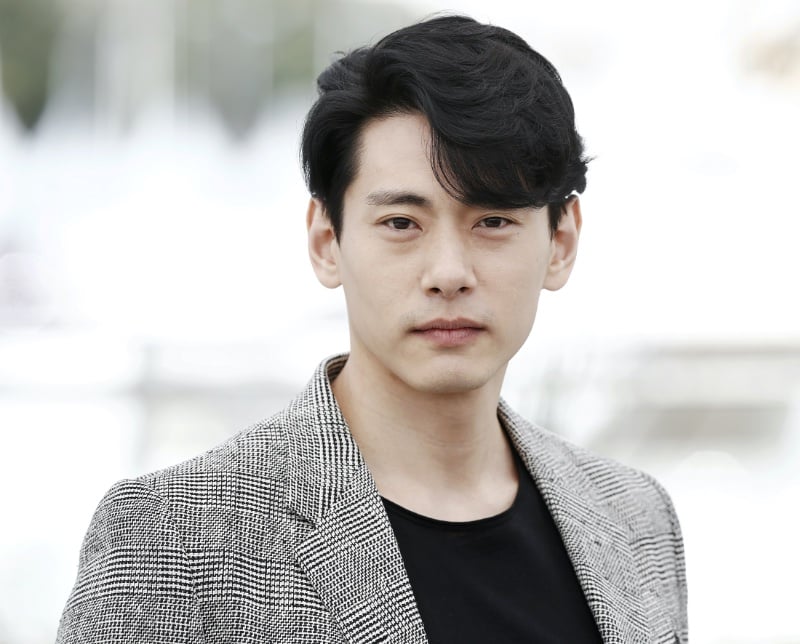 Teo Yoo with a comma hairstyle
