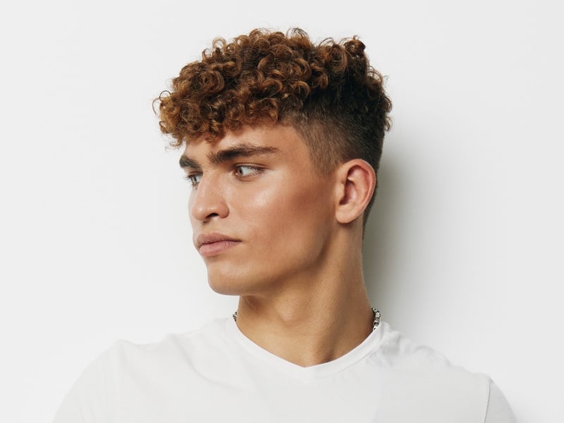 curly top mid fade