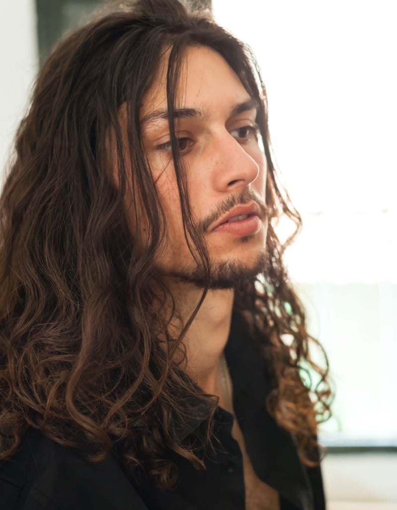 cascading long hair men