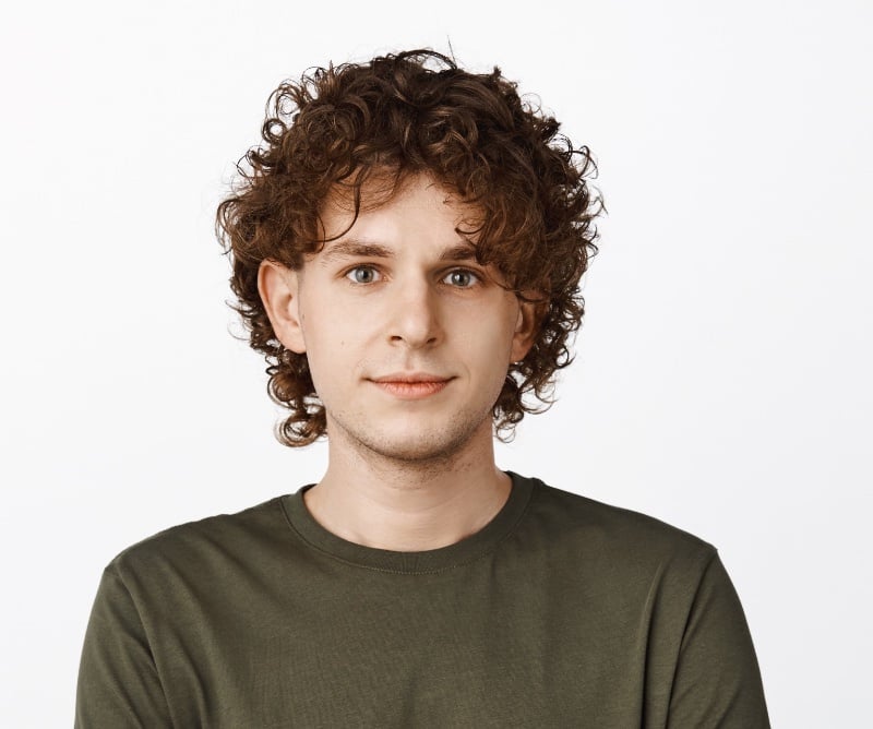 defined curly wolf cut men