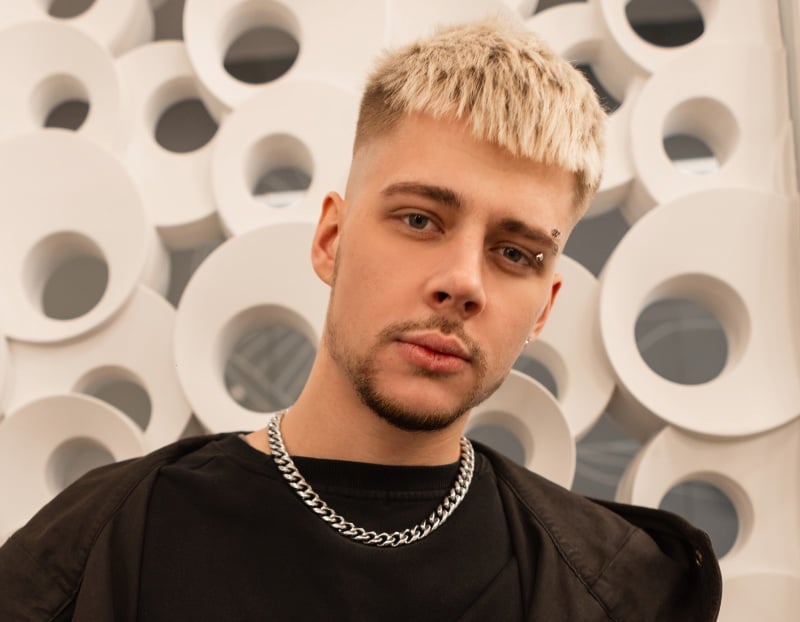 bleached French crop on straight hair with textured fringe and faded sides
