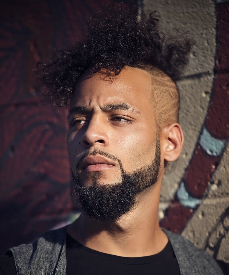 curly mohawk on Black man