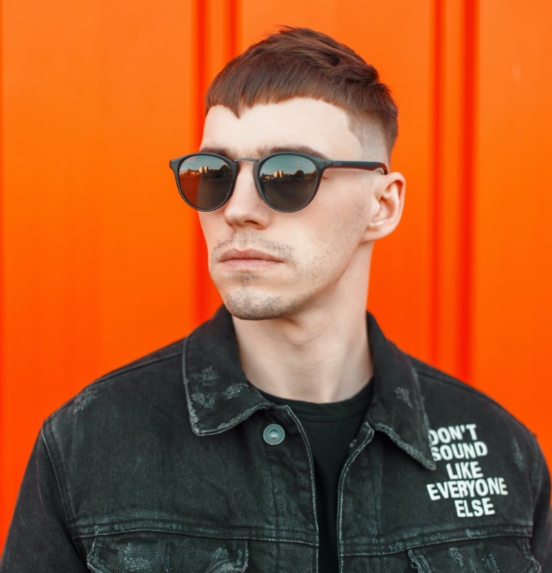 French crop with asymmetrical angular fringe and high skin fade