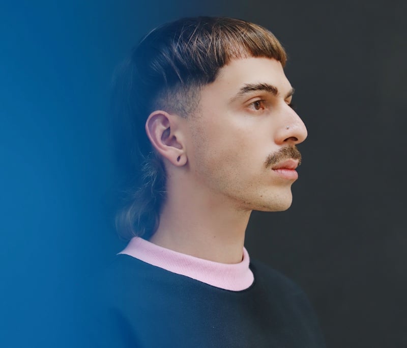 French crop mullet with choppy fringe, burst fade and long layered back