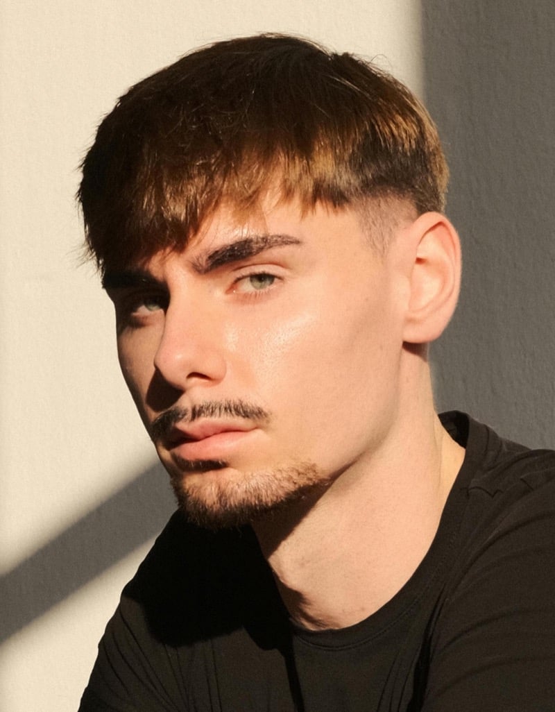 low fade French crop on light brown hair