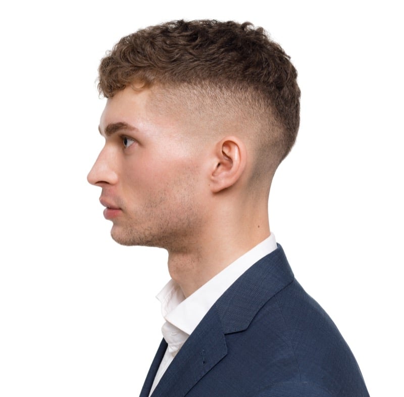 curly top with high skin fade