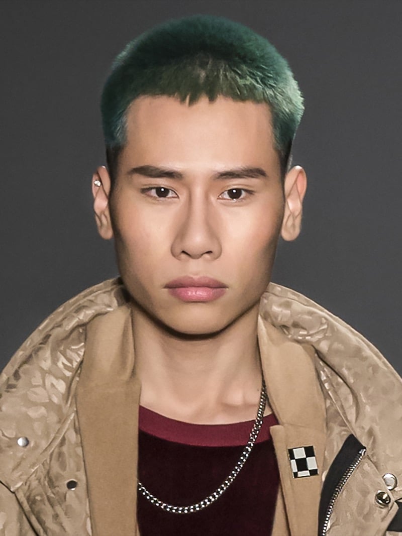 dyed buzz cut Asian man