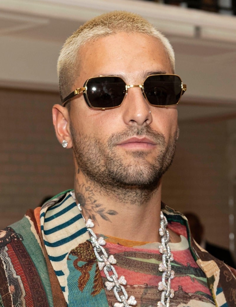 Maluma with a platinum blonde buzz cut