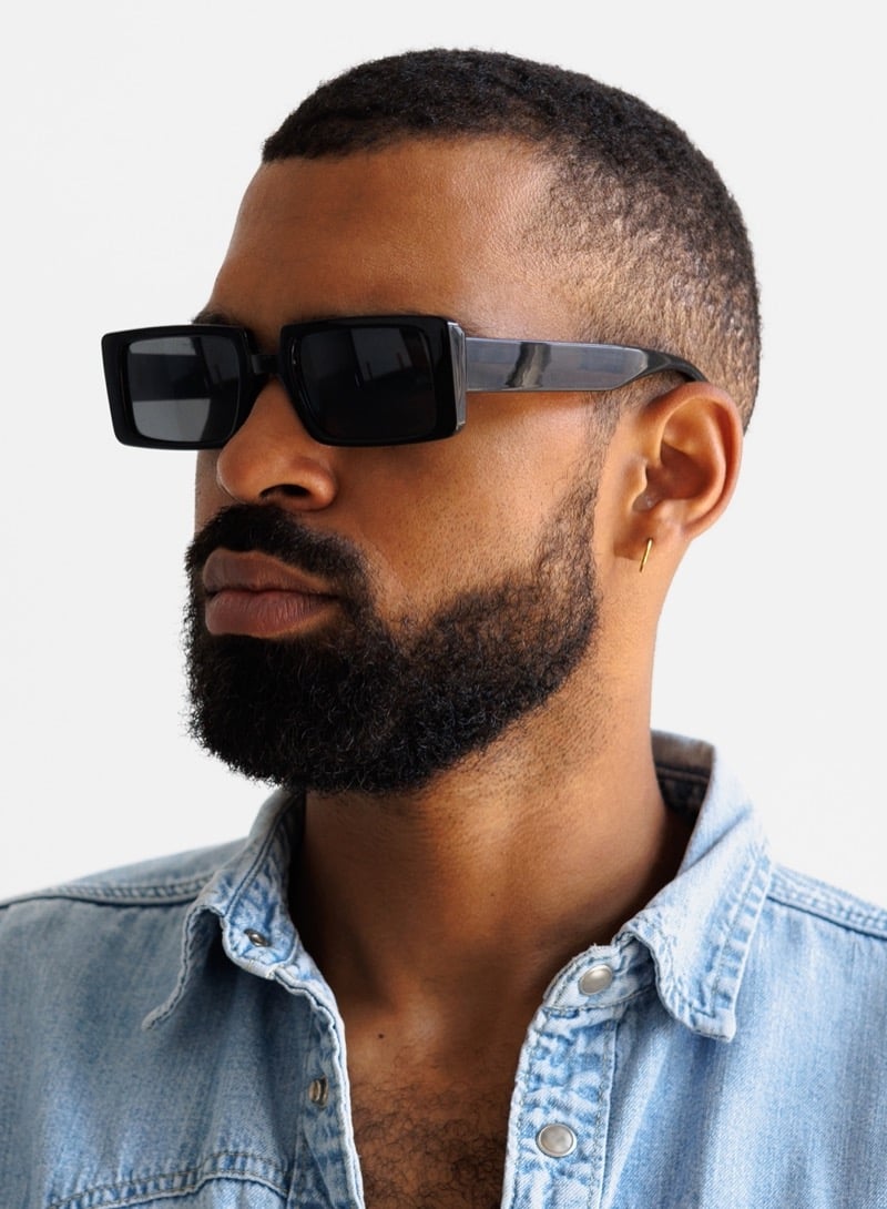 mid fade buzz cut on a Black man