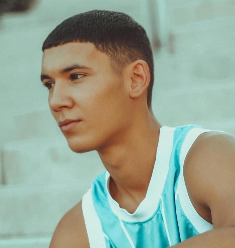 Caesar cut with mid fade