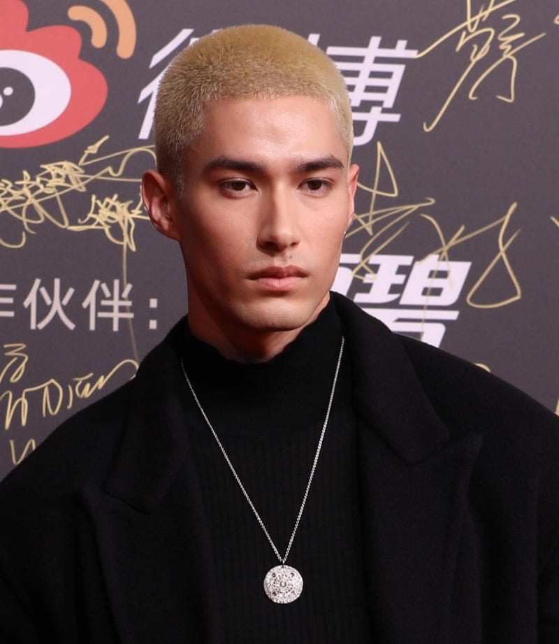 Mika Hashizume with a platinum blonde buzz cut