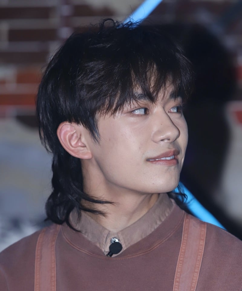 Jackson Yee with a straight hair mullet