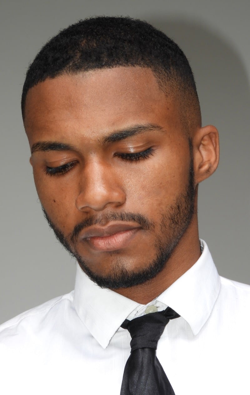 taper buzz cut on a Black man