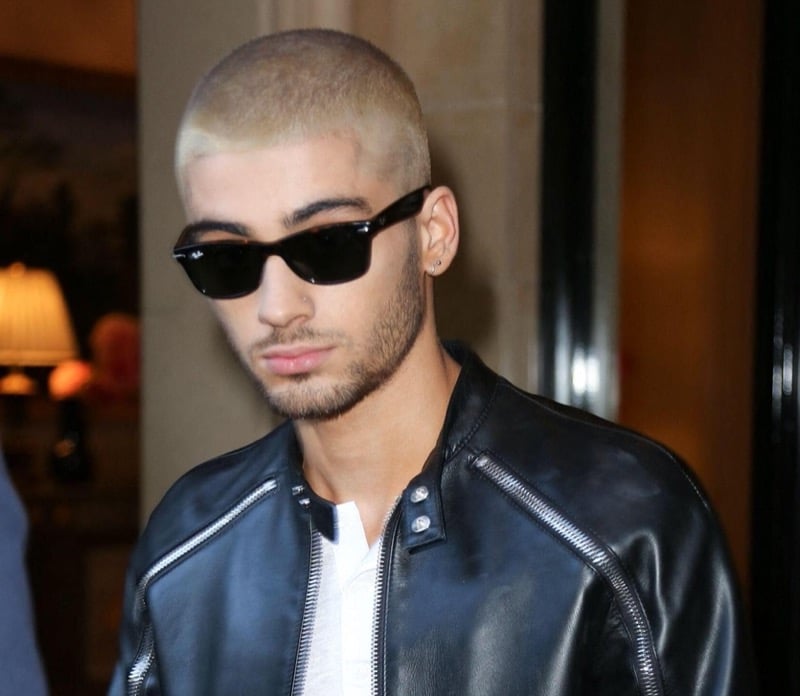 Zayn Malik with a platinum blonde buzz cut