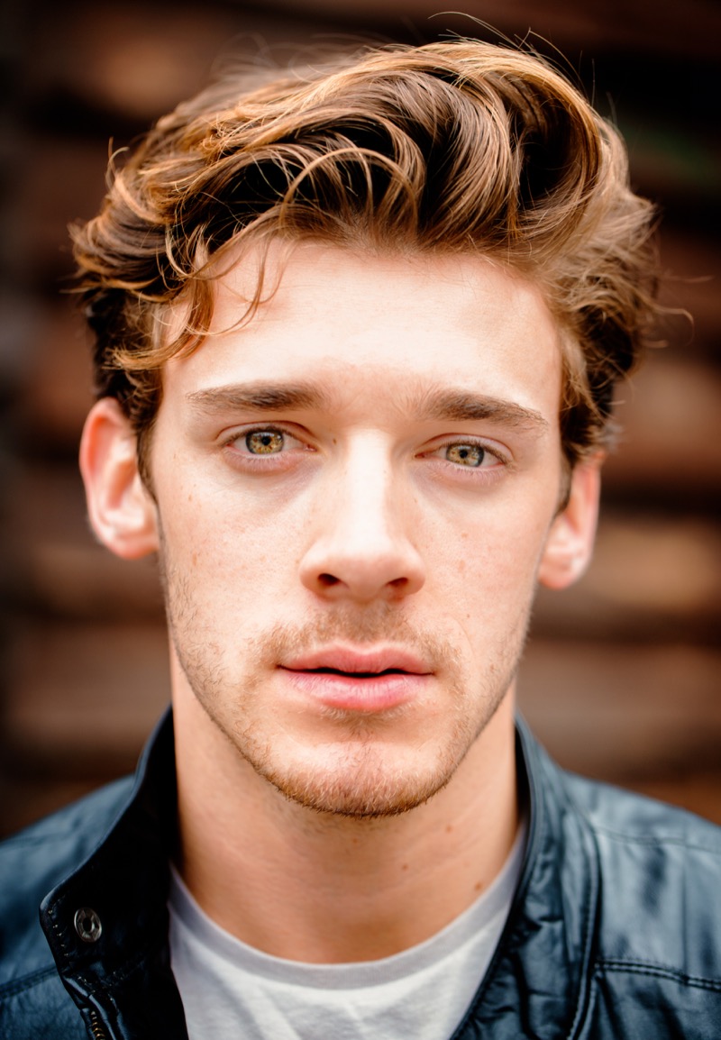 brushed back wavy hair men