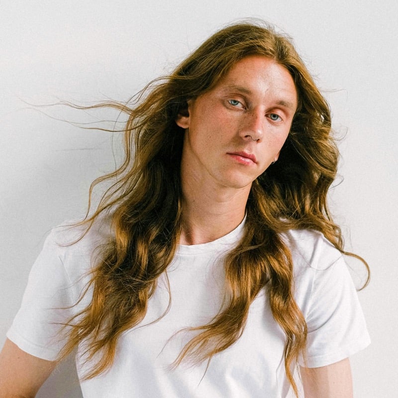 long wavy hair middle part men