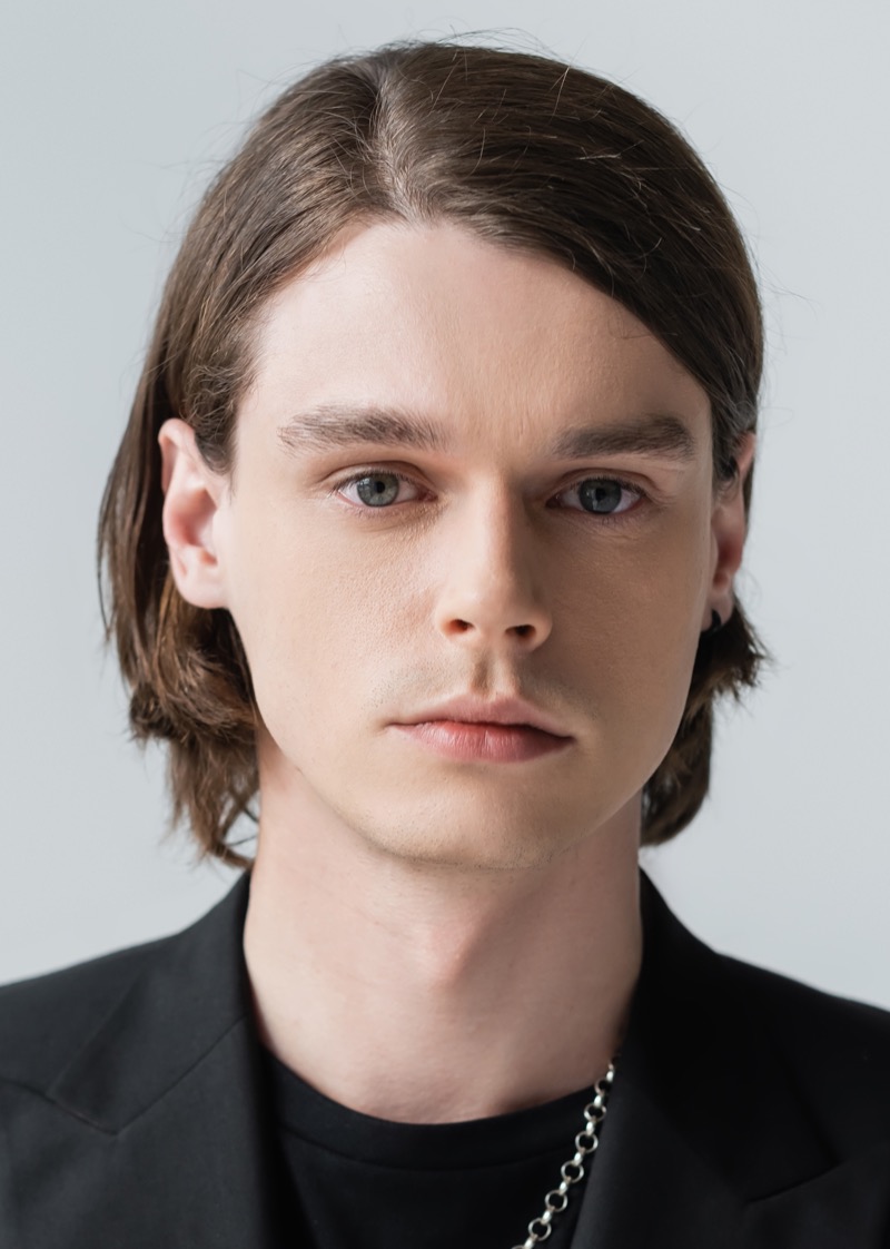 medium-length straight hair with side part