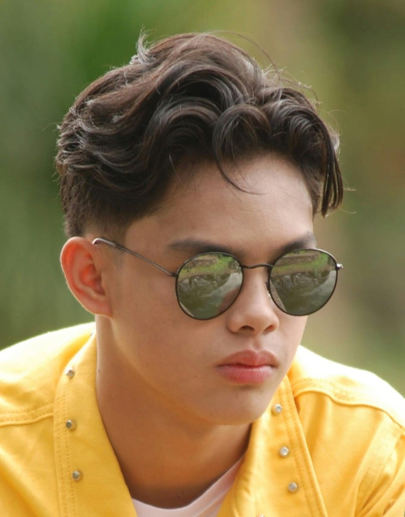 wavy side part men