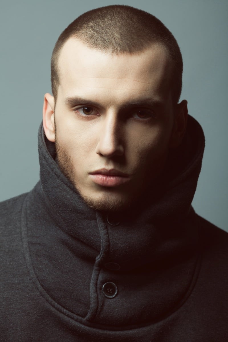 man with a short buzz cut