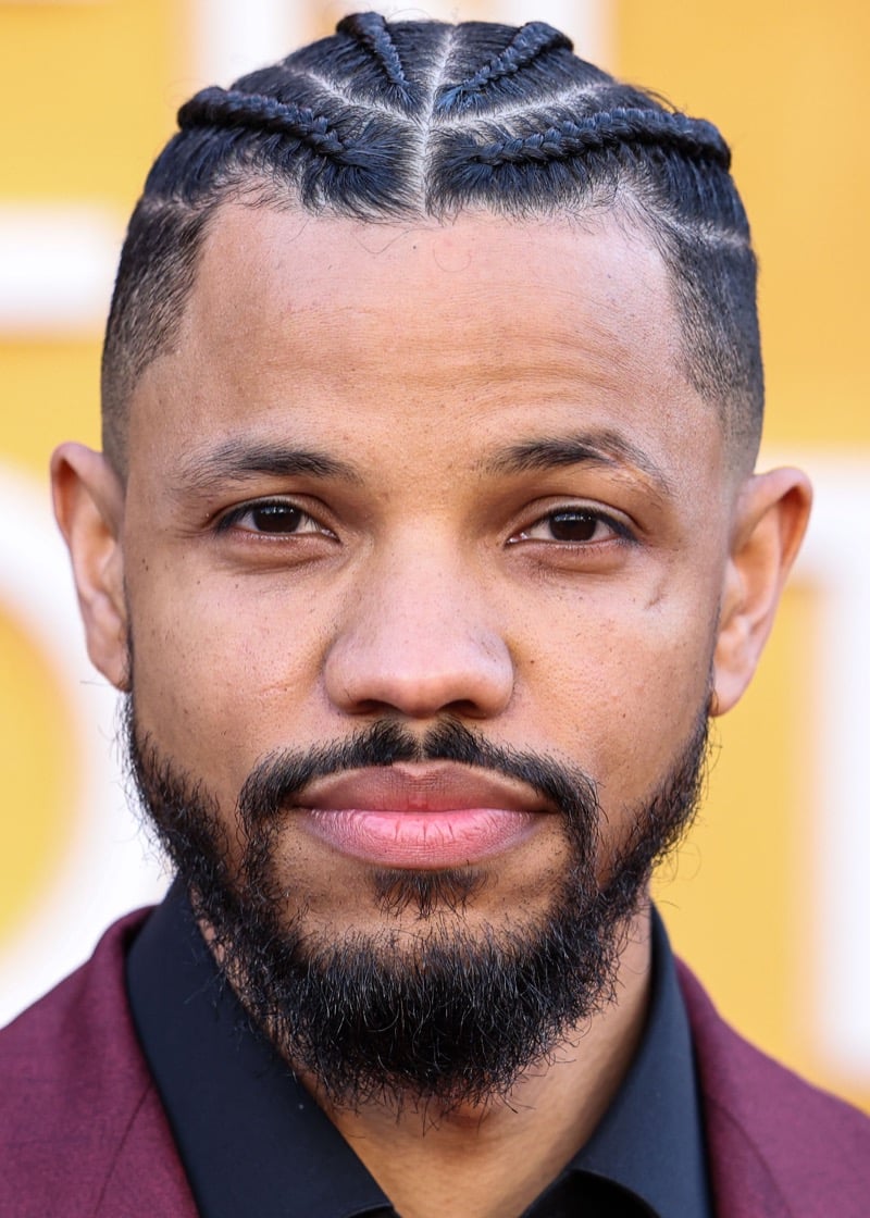 Tunji Kasim with cornrows hairstyle