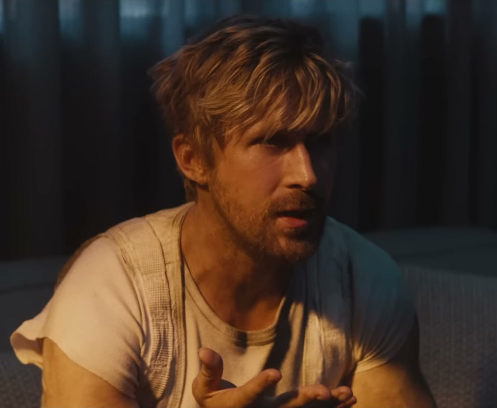 Ryan Gosling with layered blond hair and a long side-swept fringe in The Fall Guy